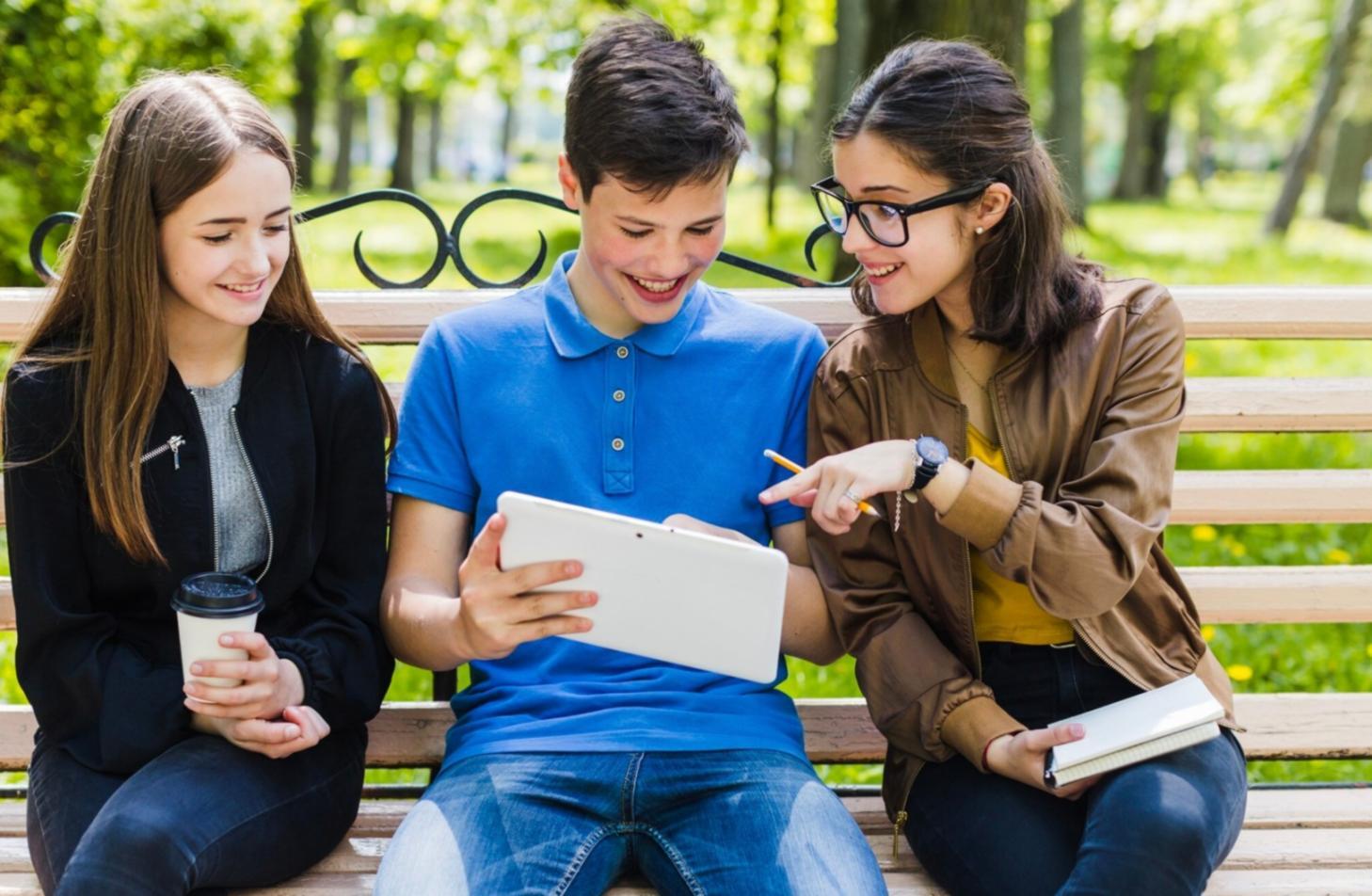Graduates of financial communication program collaborating and applying learned techniques